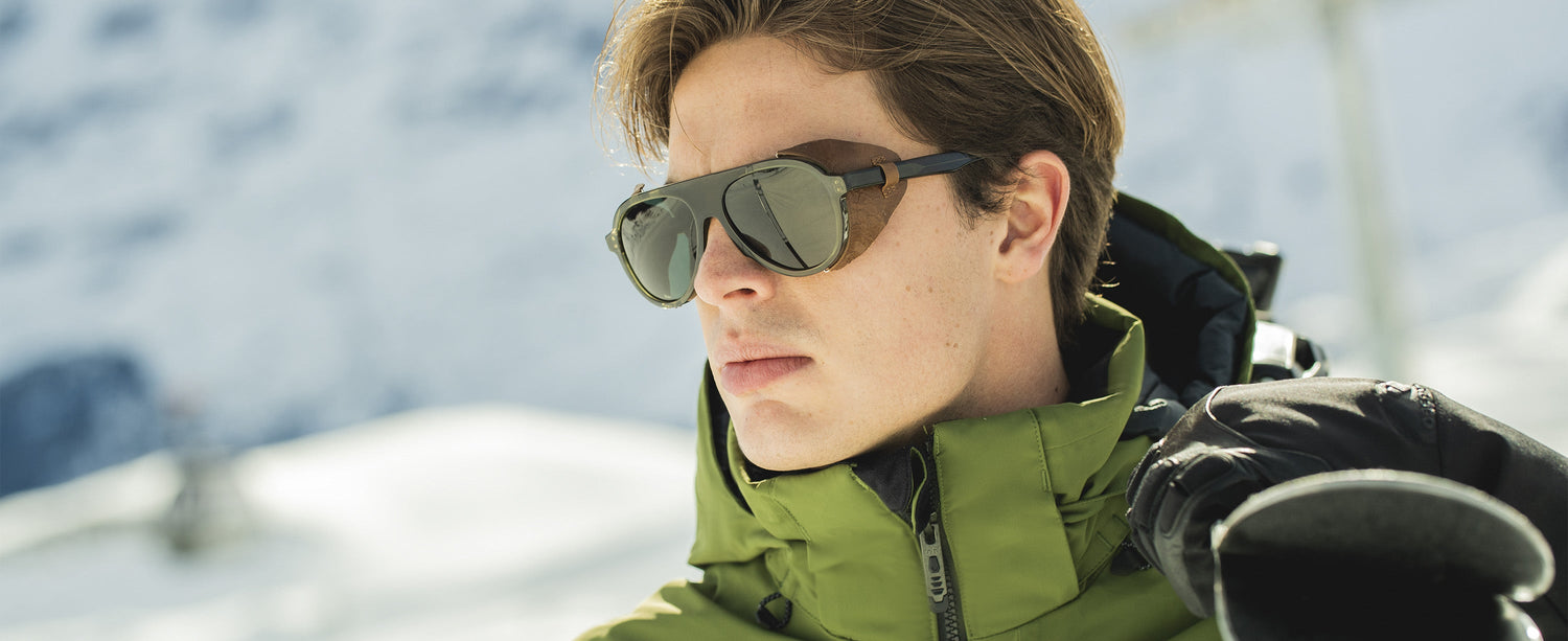 Male skier wearing Obermeyer sunglasses