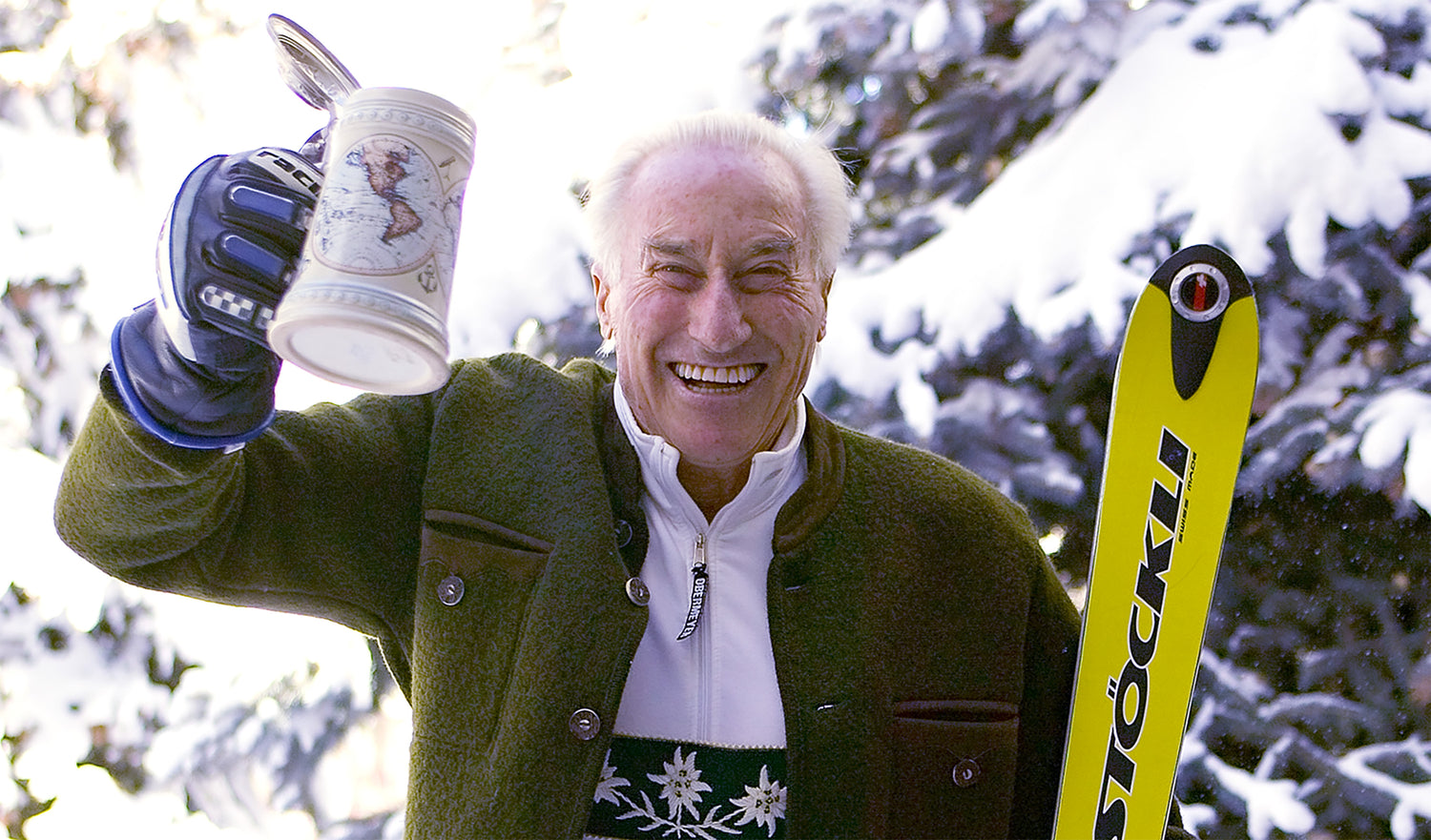 Klaus Obermeyer toasting to skiing logevity