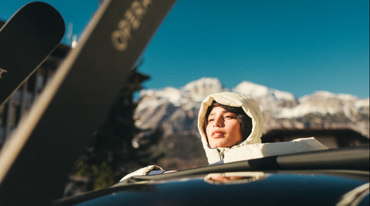 Women getting out of car in Obermeyer Jacket