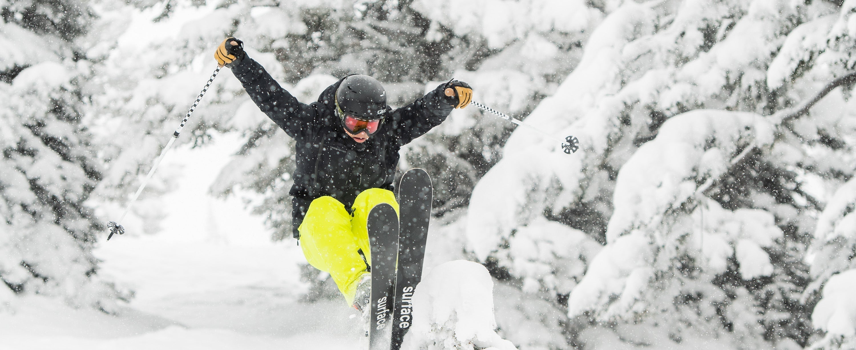 Male skier wearing Obermeyer ski pants.