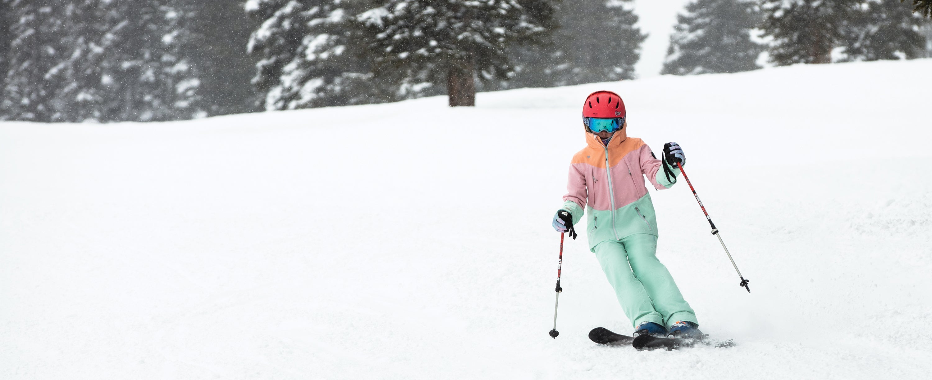 A teen girl skier wearing Obermeyer.