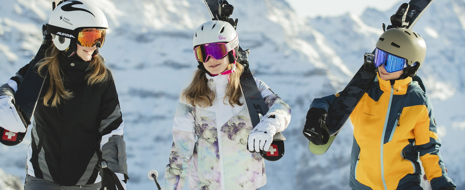 Two teen girl skiers wearing Obermeyer.