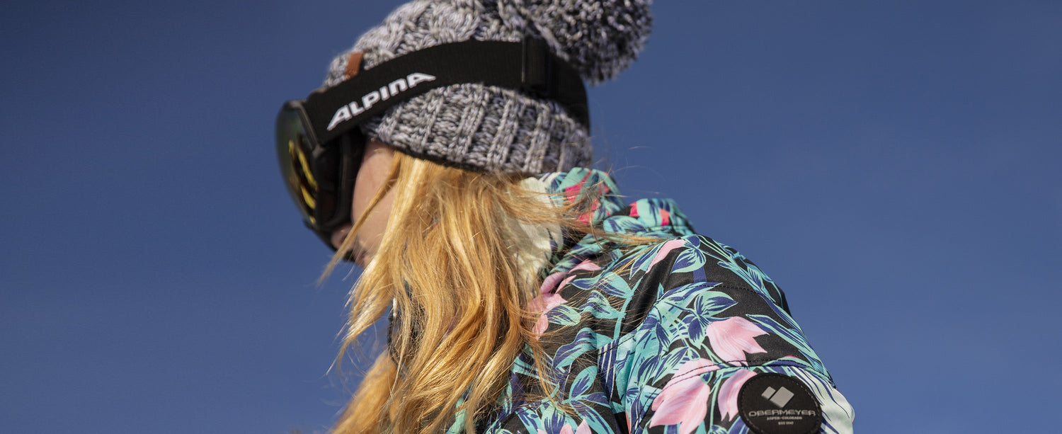 Teen girl skier wearing Obermeyer beanie