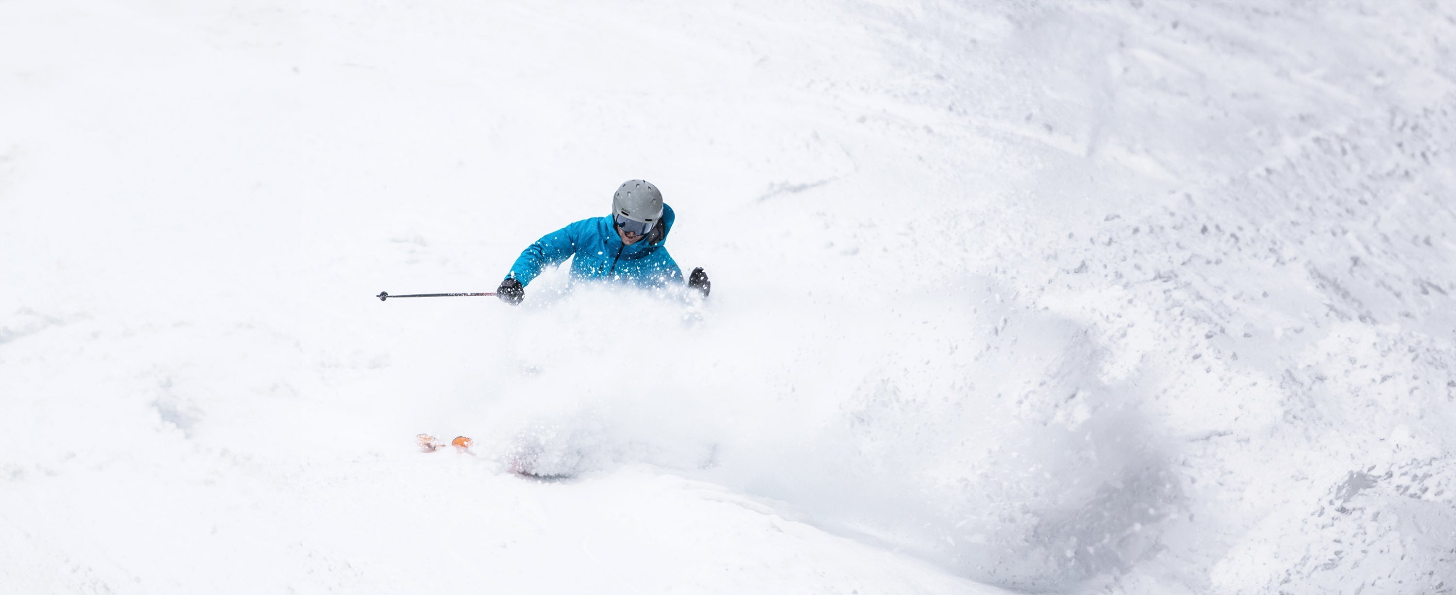 Male skier at Aspen Snowmass wearing Obermeyer Ski Pants.