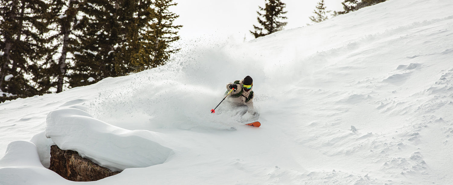 Male skier wearing an Obermeyer jacket.