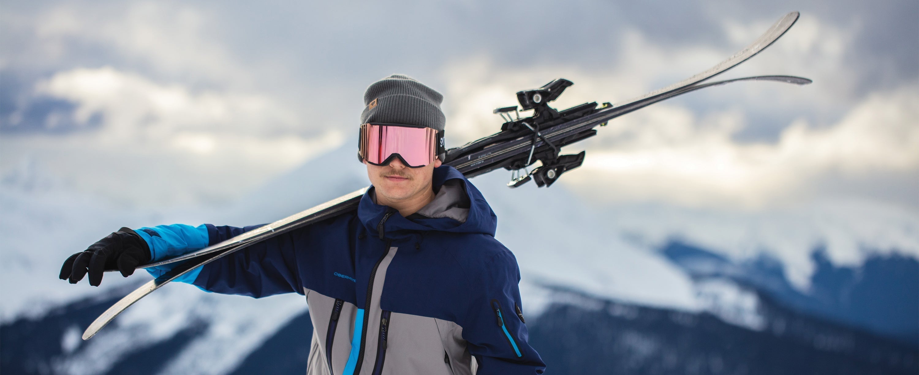 Male skier wearing an Obermeyer beanie.