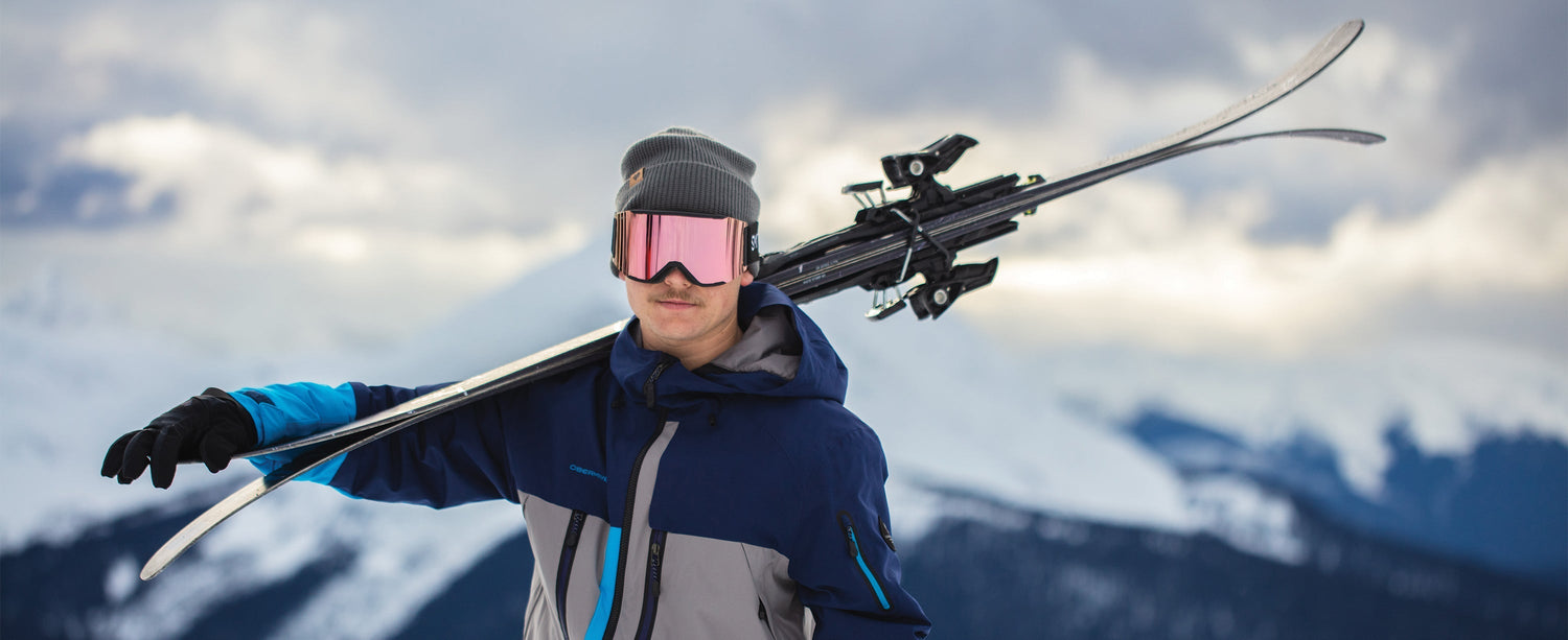 Male skier wearing an Obermeyer beanie.