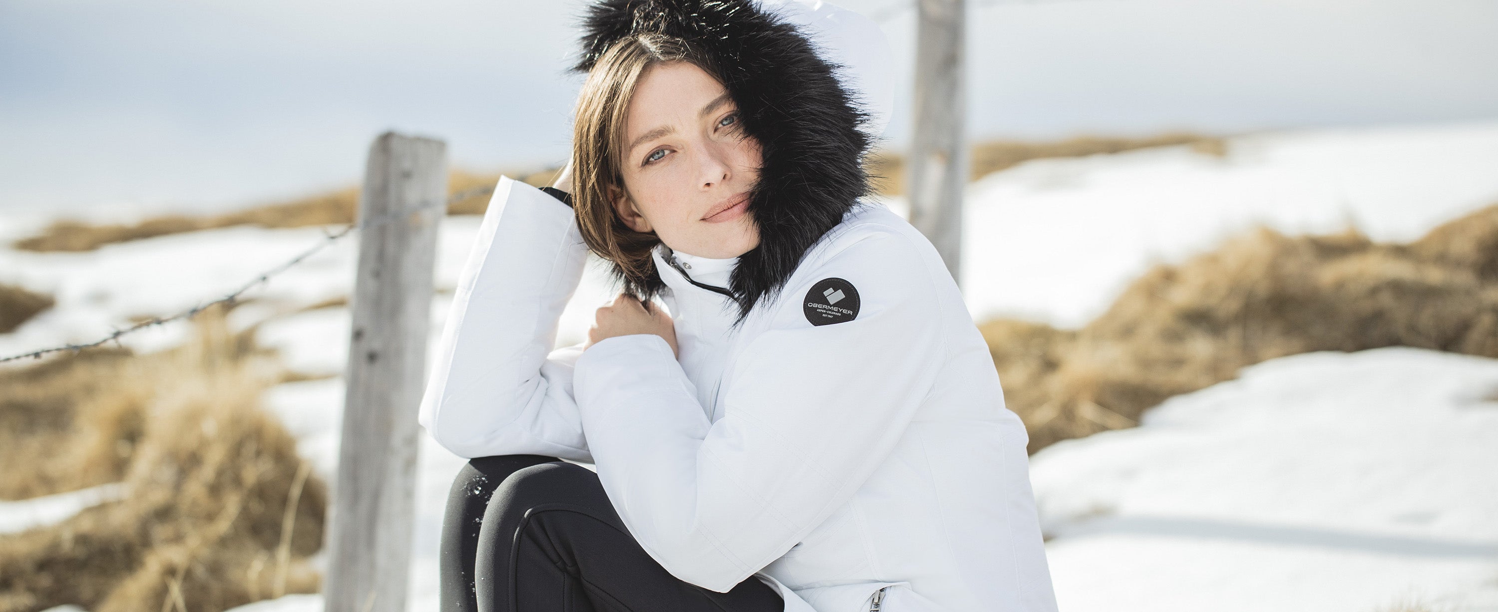 Female wearing Obermeyer Sojourner Parka.