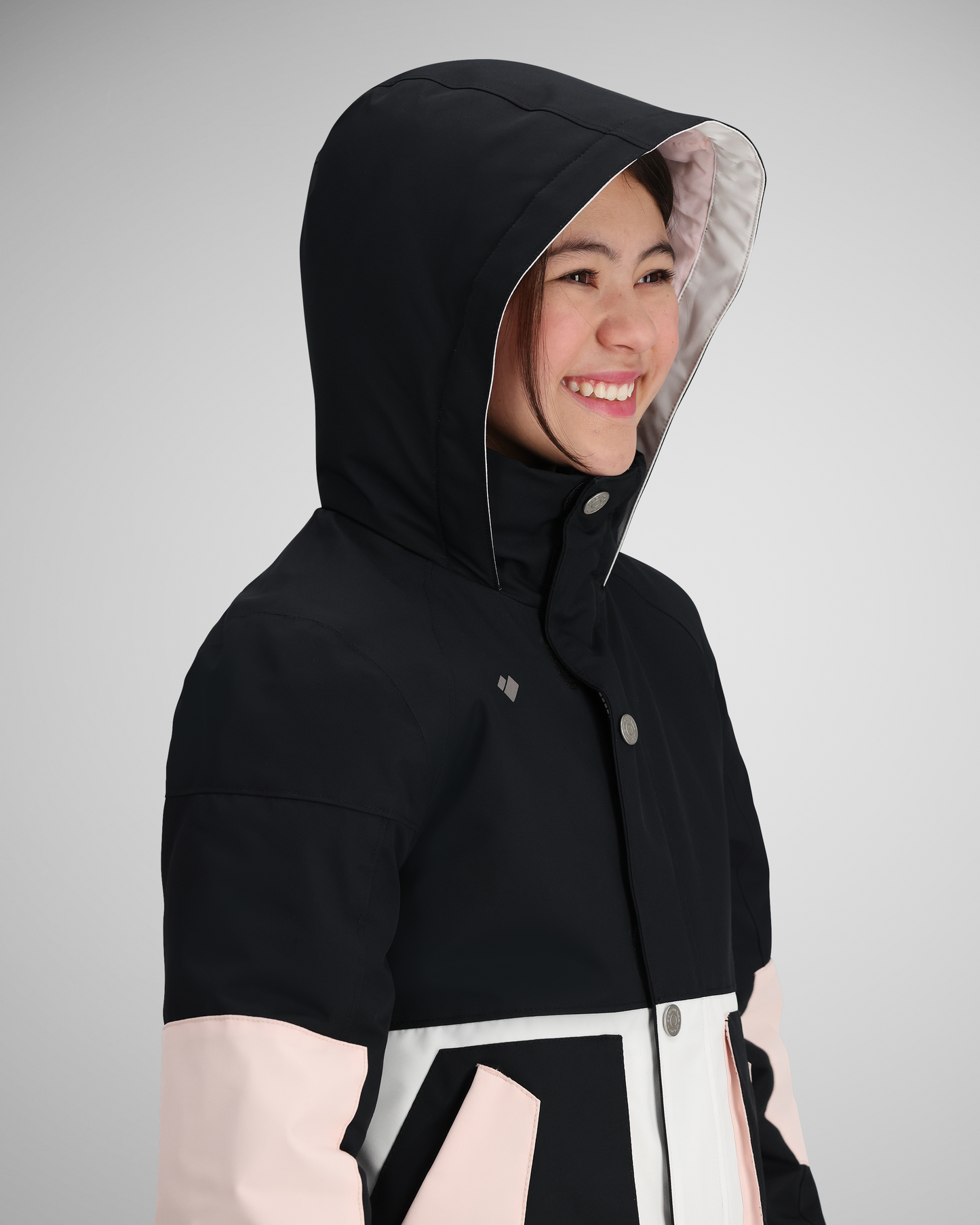 Adjustable hood | Hoods are invaluable for extra protection and comfort in the elements. Depending on the style and its purpose, all Obermeyer hoods offer a wide range of adjustments. Each hood is specifically designed with each jacket style to best shelter your head and neck in challenging weather conditions.