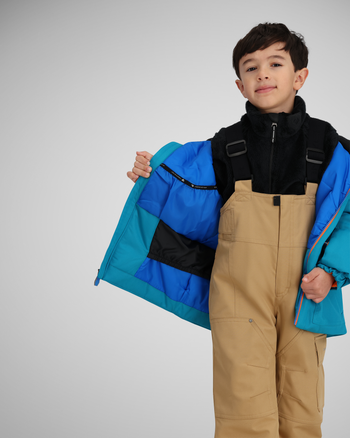 Water-resistant powderskirt | A section of elasticized fabric at the bottom of a jacket above the hem. It includes a gripper elastic bottom to create a snug barrier around your waist to keep snow and cold from going up your little one's back.