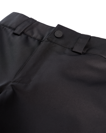
Close-up detail shot of black trousers showing the waistband, belt loops, button closure, and front seam against a white background.